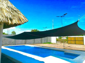 Bella casa de playa junto2, al mar
